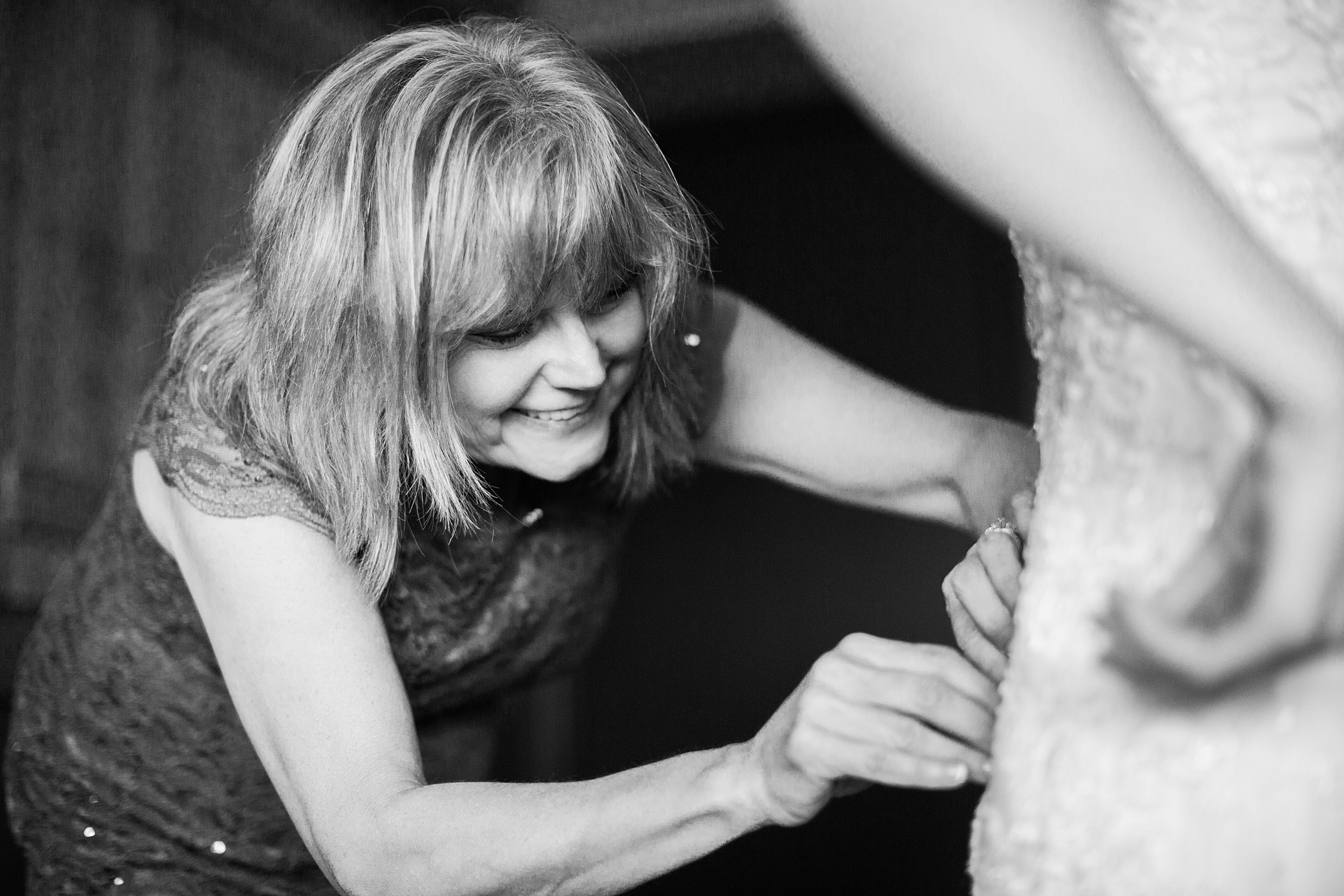 Bride getting dressed | Megan Montalvo Photography 