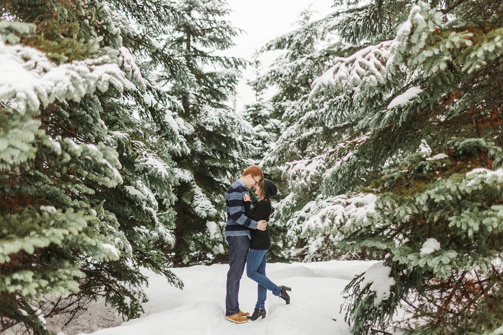 Couple surrounded by snowy trees at Snoqualmie | Megan Montalvo Photography