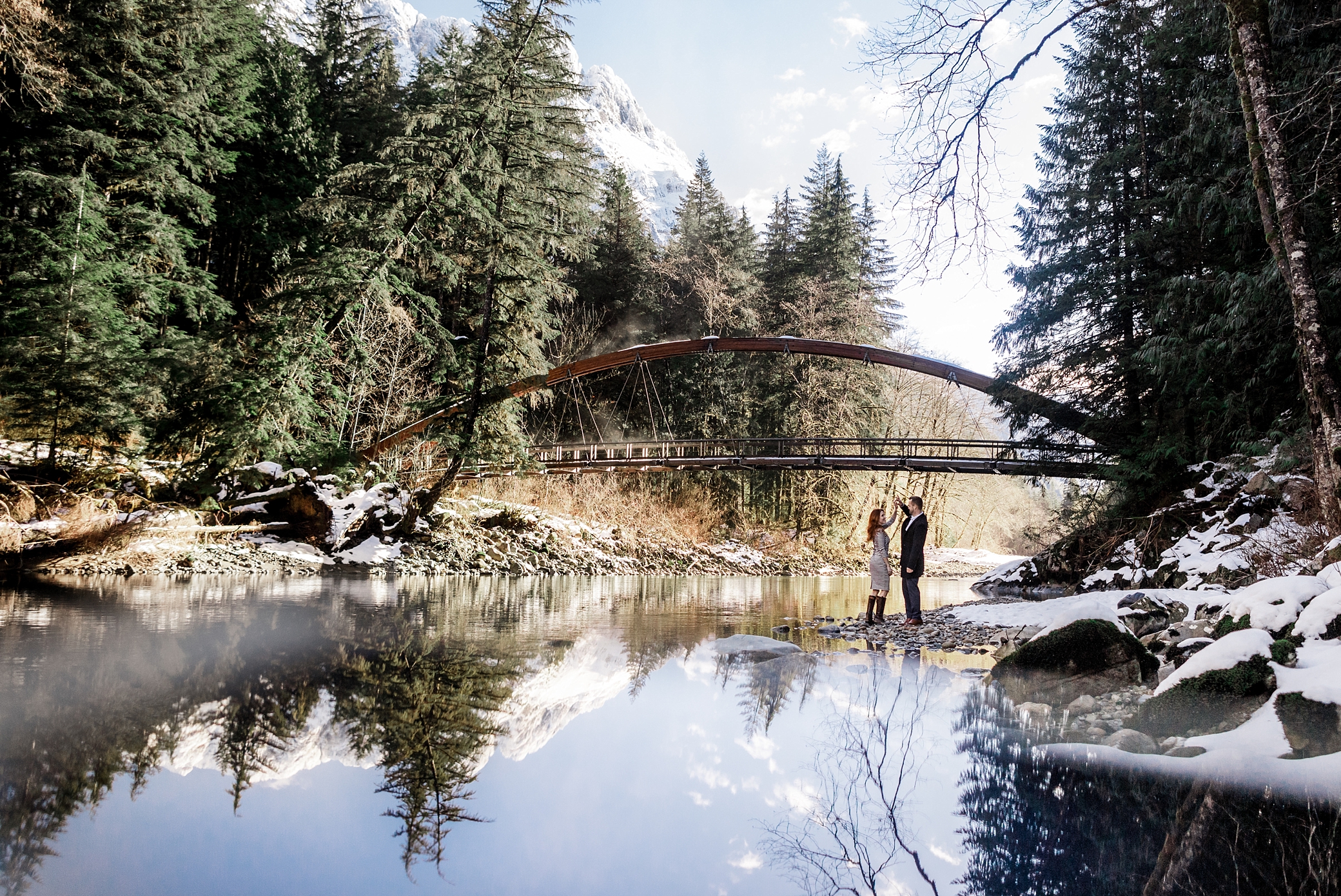 Couple dancing in the snow during their Washington adventure session with Seattle Adventure Photographer, Megan Montalvo Photography