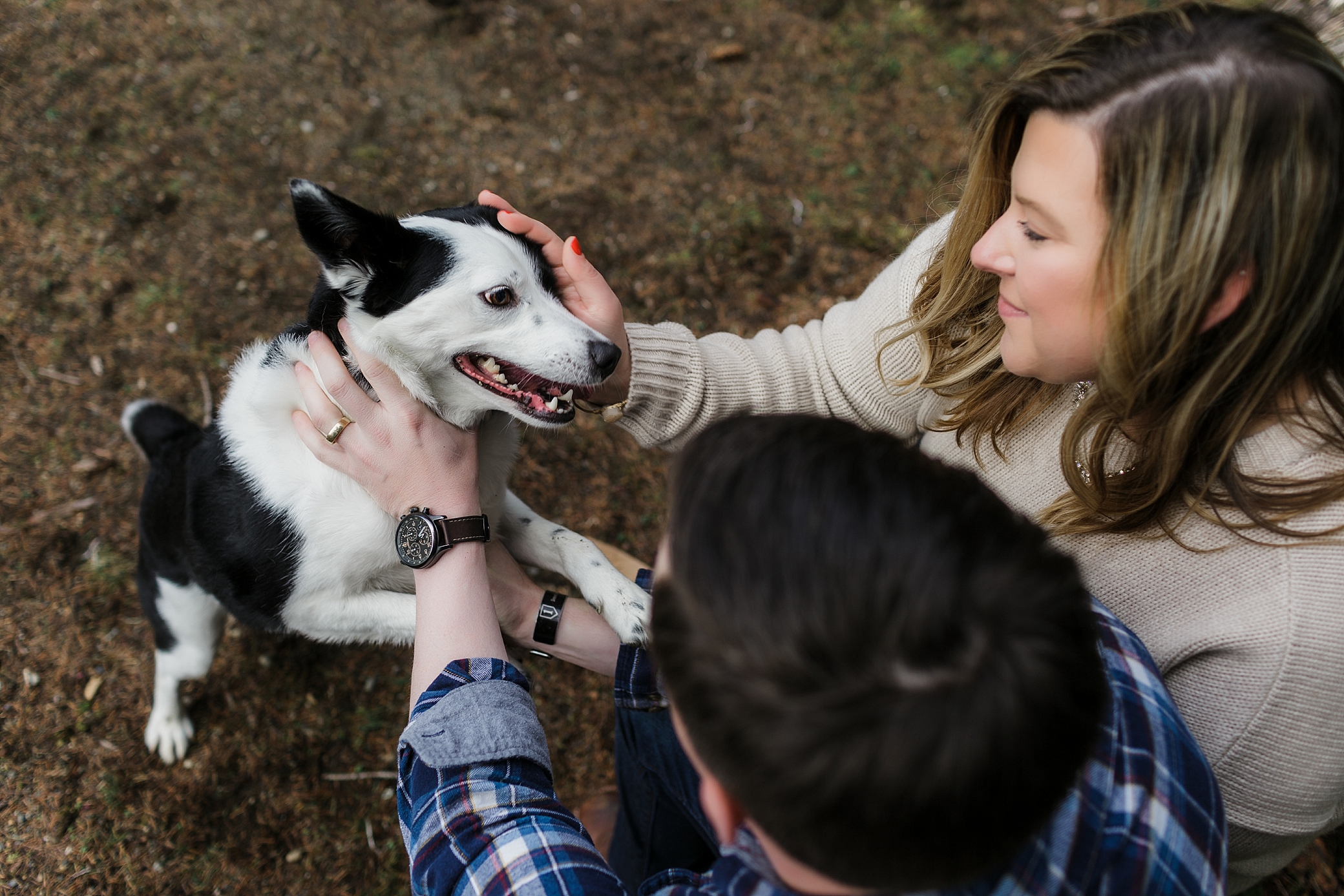 Couple adoring their dog during family photoshoot | Megan Montalvo Photography