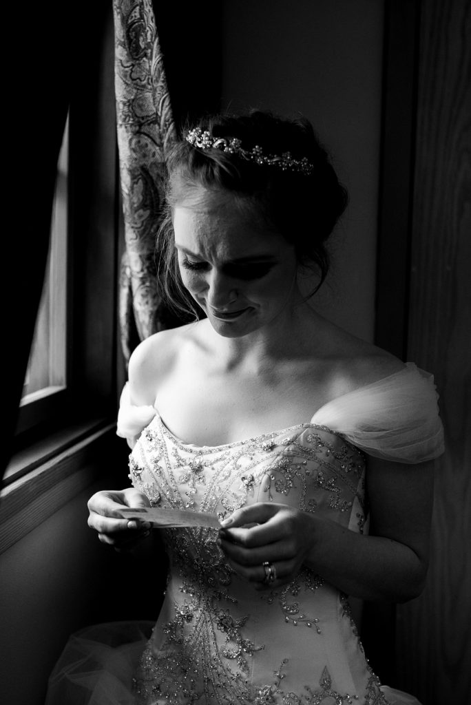 Bride receives letter from soon-to-be husband before wedding. Captured by Olympia Wedding Photographer, Megan Montalvo Photography. 