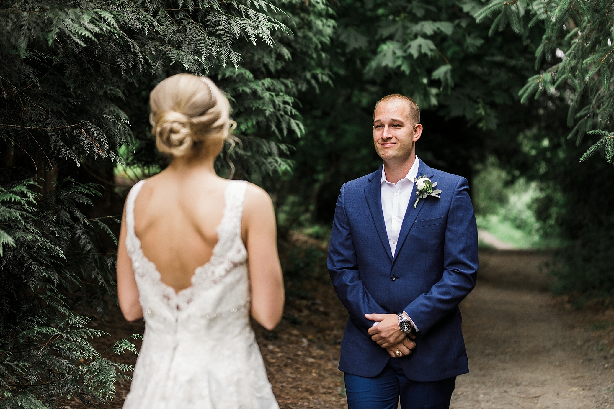 Emotional first look between bride and groom photographed by Woodinville Wedding Photography, Megan Montalvo Photography 