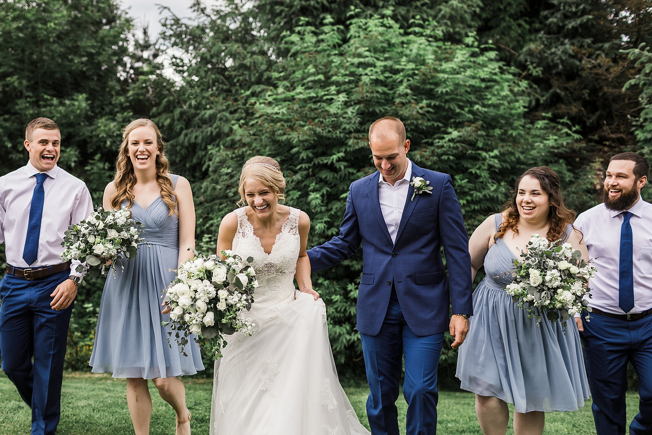 Bride and groom with wedding party | Megan Montalvo Photography 