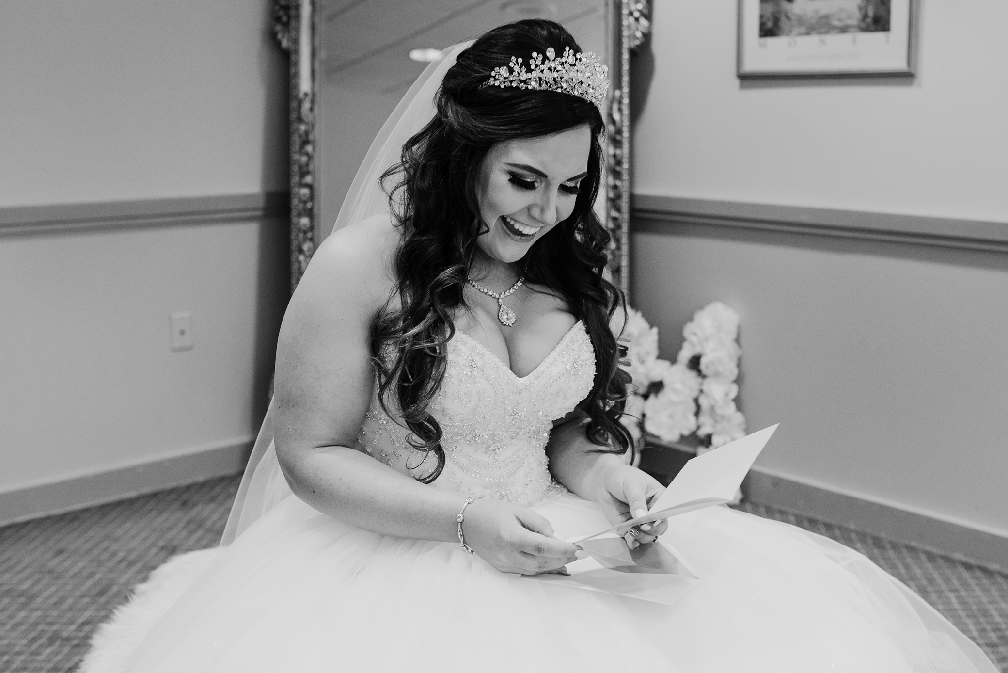 Bride reading letter from her soon to be husband | Megan Montalvo Photography 