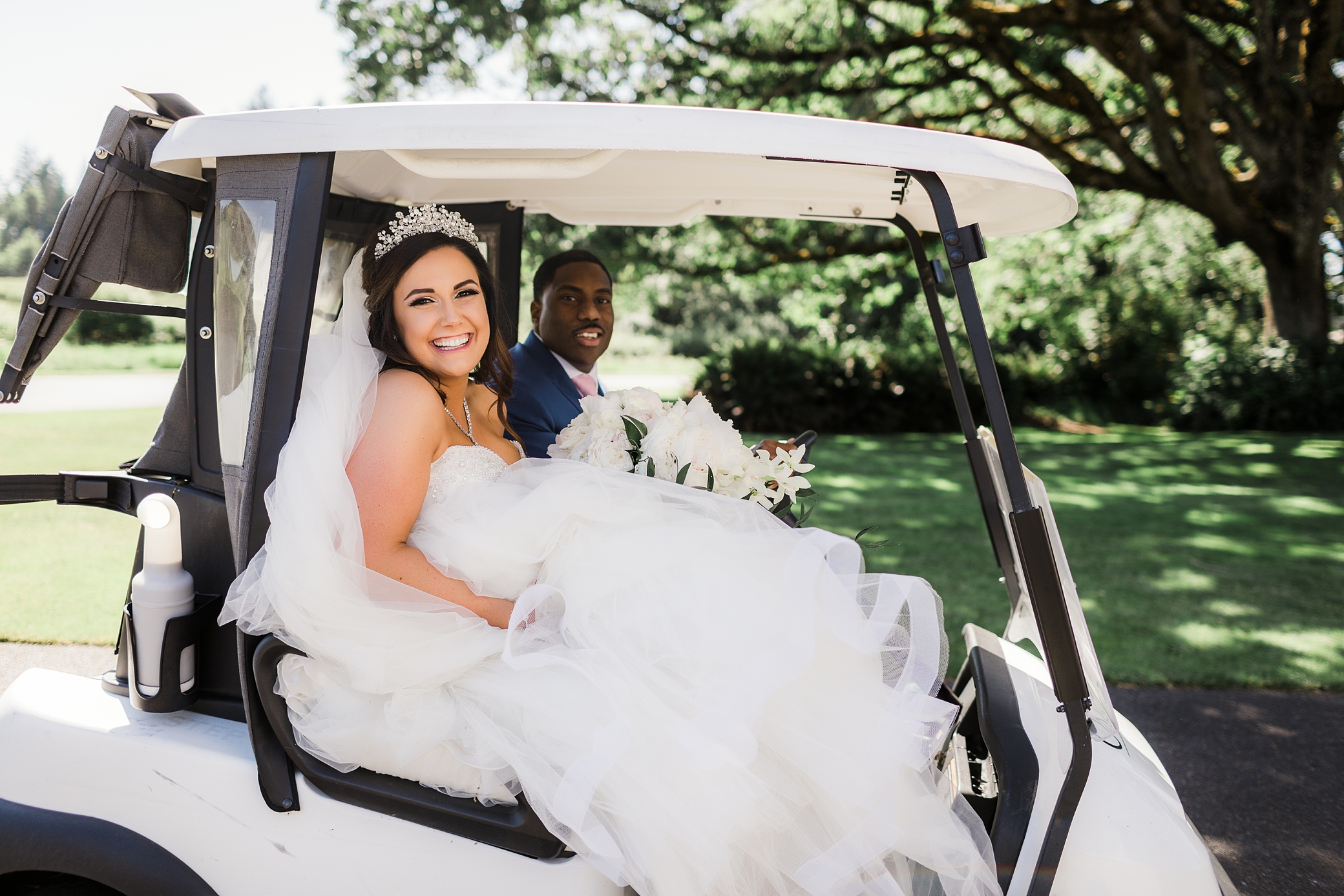 Bride and groom of golf cart at Indian Summer Golf & Country Club in Olympia, WA | Megan Montalvo Photography