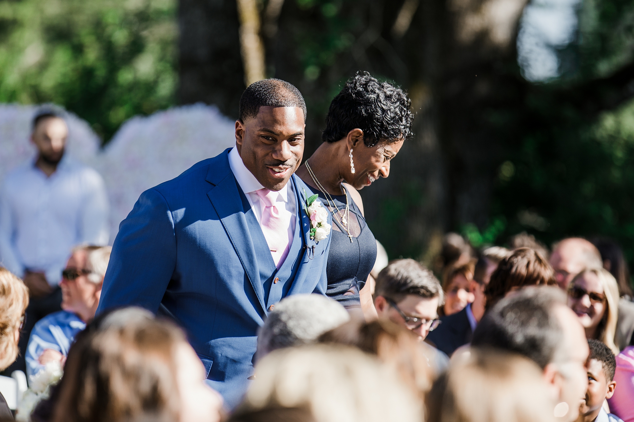 Groom and his mother walking down the aisle | Megan Montalvo Photography