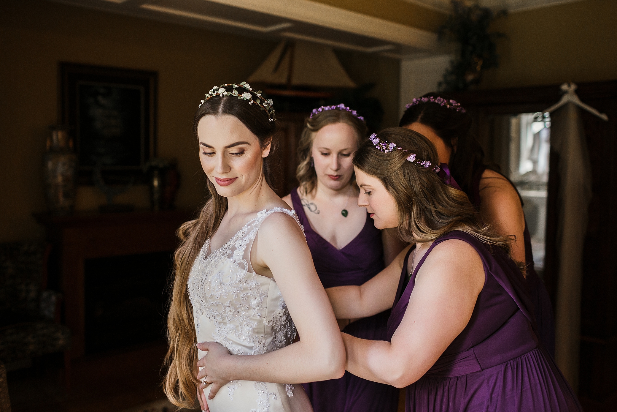 Bride getting ready with bridesmaids for wedding at Tacoma's Thornewood Castle with Tacoma Wedding Photographer, Megan Montalvo Photography