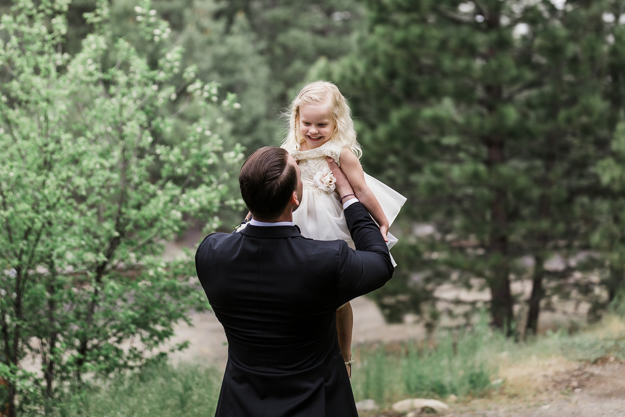 Groom does a first look with the flower girl | Megan Montalvo Photography 