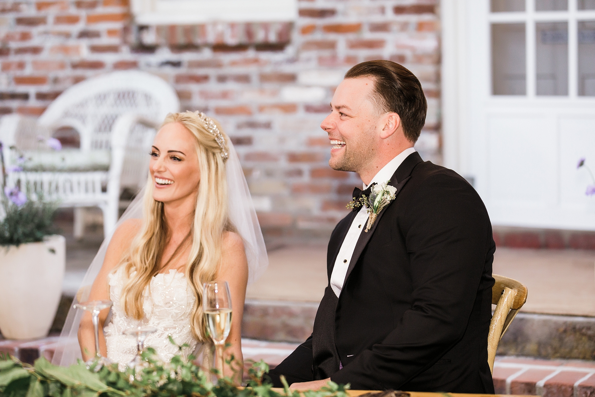 Bride and groom reaction during family toast at Lake Tahoe Wedding | Megan Montalvo Photography 