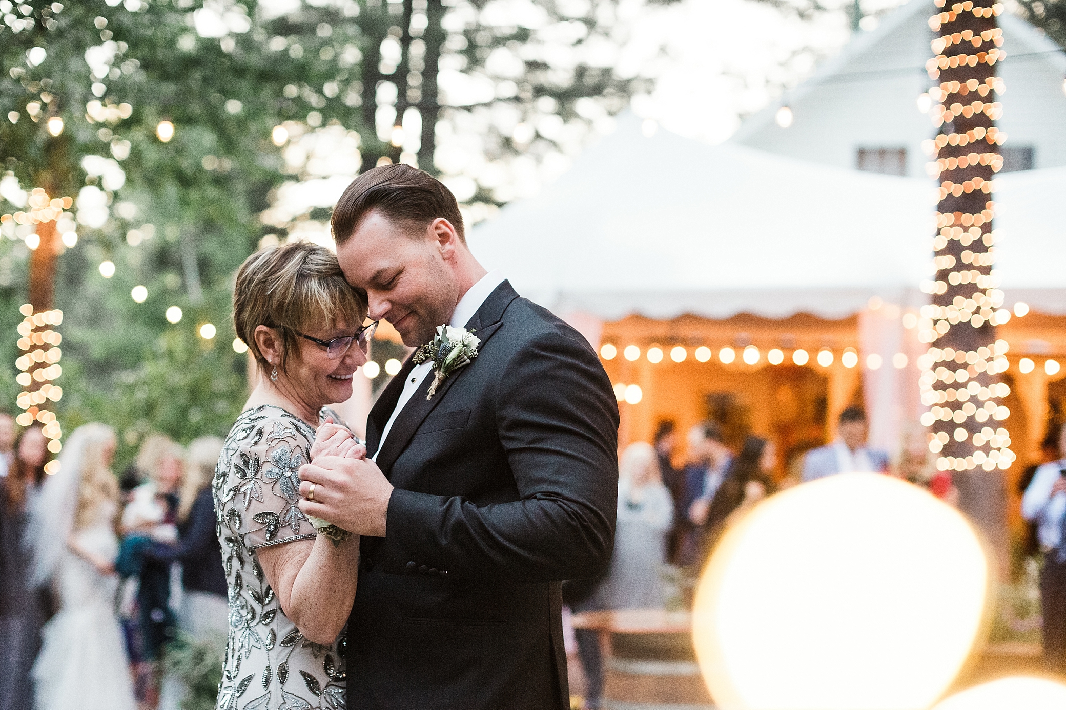 Groom and mother dancing at Lake Tahoe Wedding | Megan Montalvo Photography 