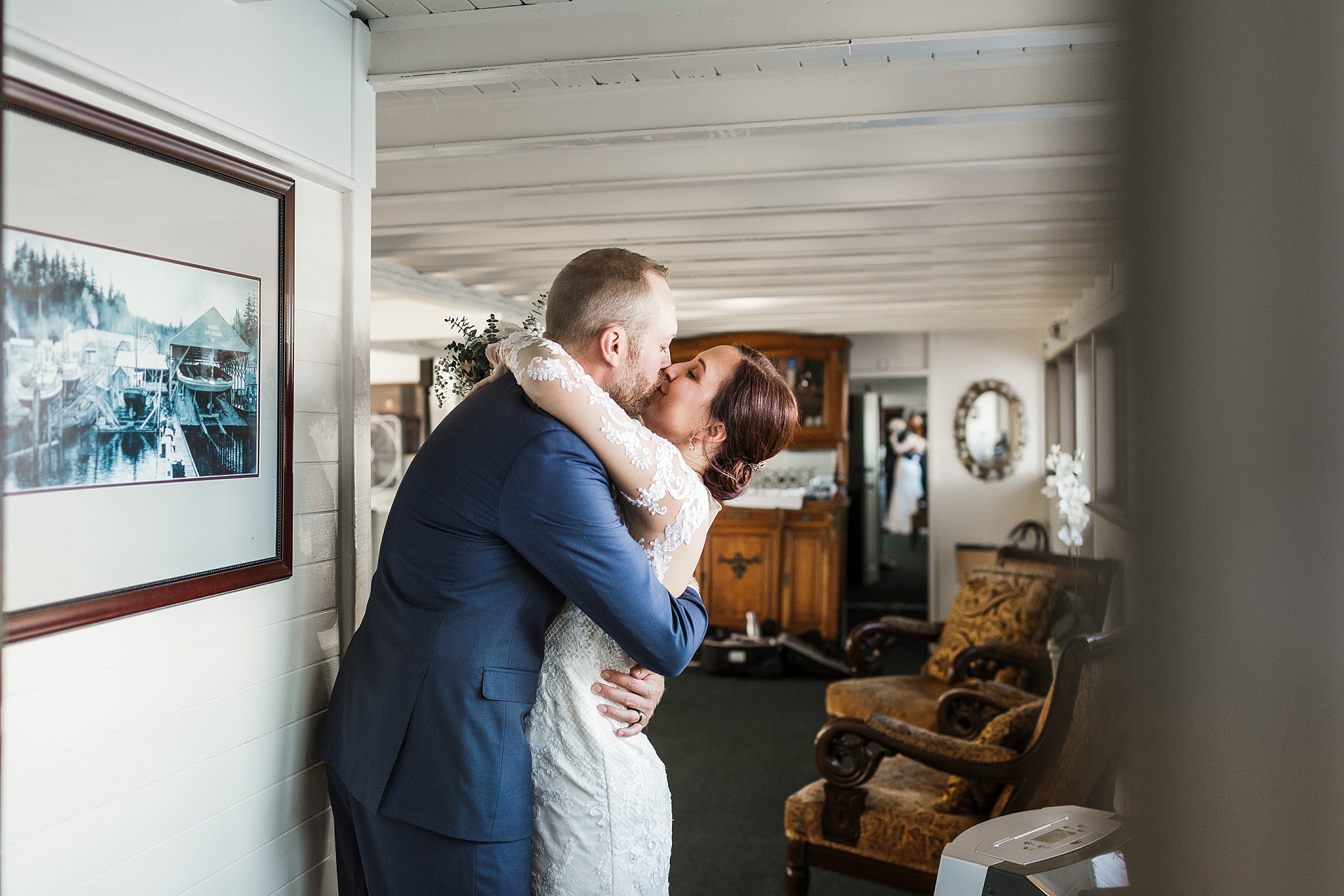 Bride and groom are married! A special moment on the MV Skansonia after their waterfront ceremony. Wedding photographed by PNW Wedding Photographer, Megan Montalvo Photography 