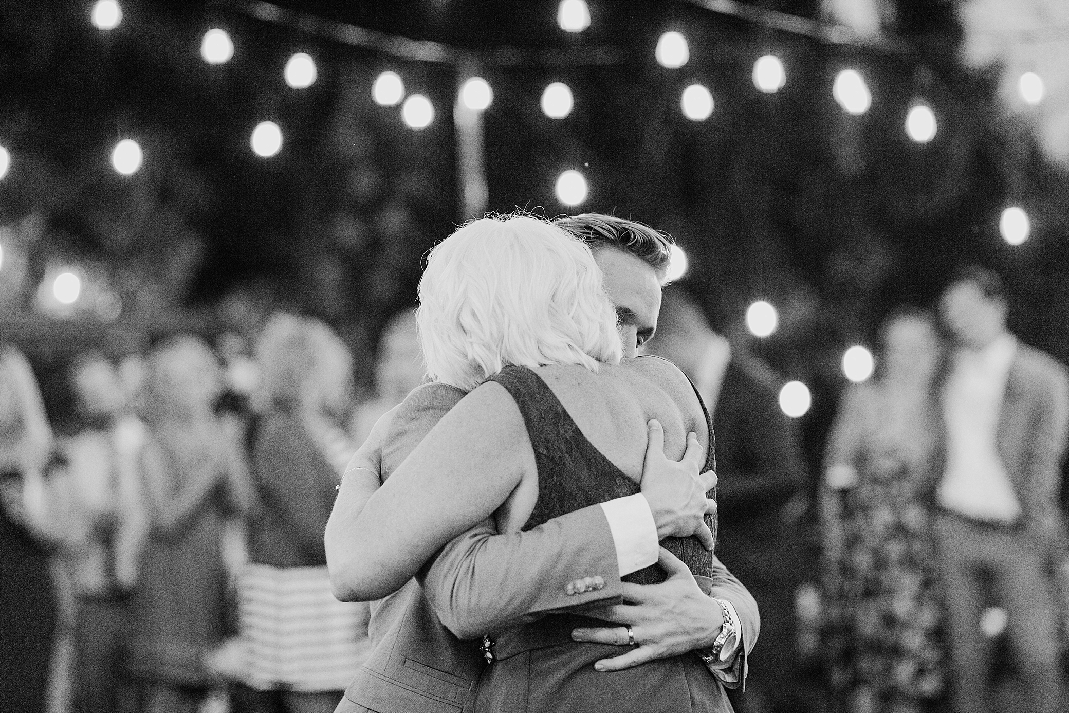 Mother and Groom dance at backyard wedding reception | Megan Montalvo Photography