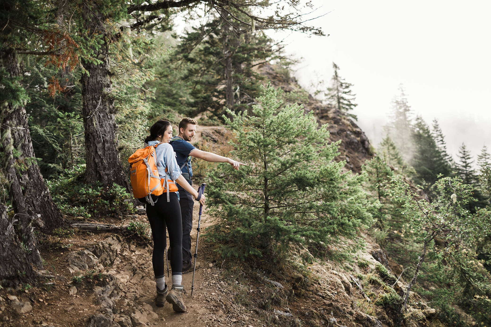 Couple hikes Mount Storm King in the Olympic National Park before Hurricane Ridge Elopement Ceremony. Photographed by Elopement Photographer, Megan Montalvo Photography. 
