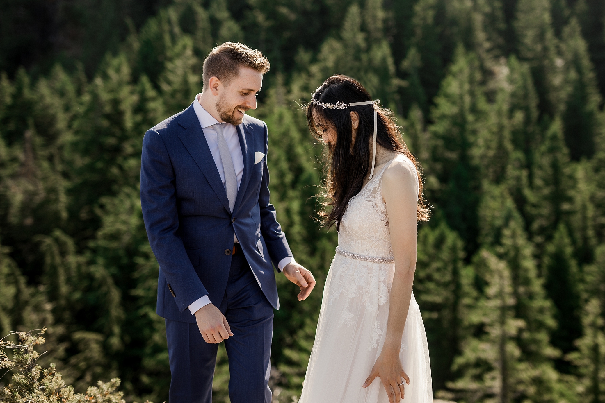 Bride and groom first look before exchanging vows at the top of Mount Storm King trail | Megan Montalvo Photography 