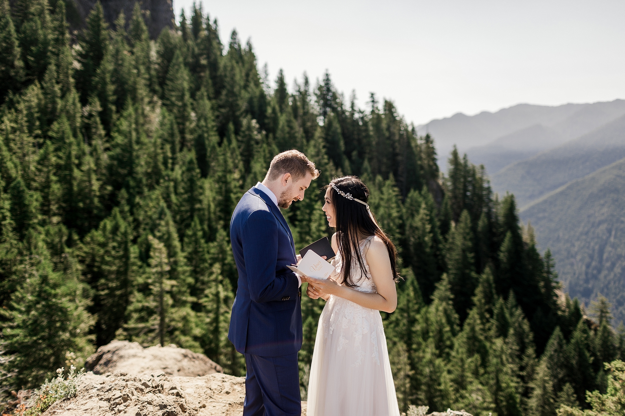 Intimate vow exchange at the top of Mount Storm King in the Olympic National Park | Megan Montalvo Photography 