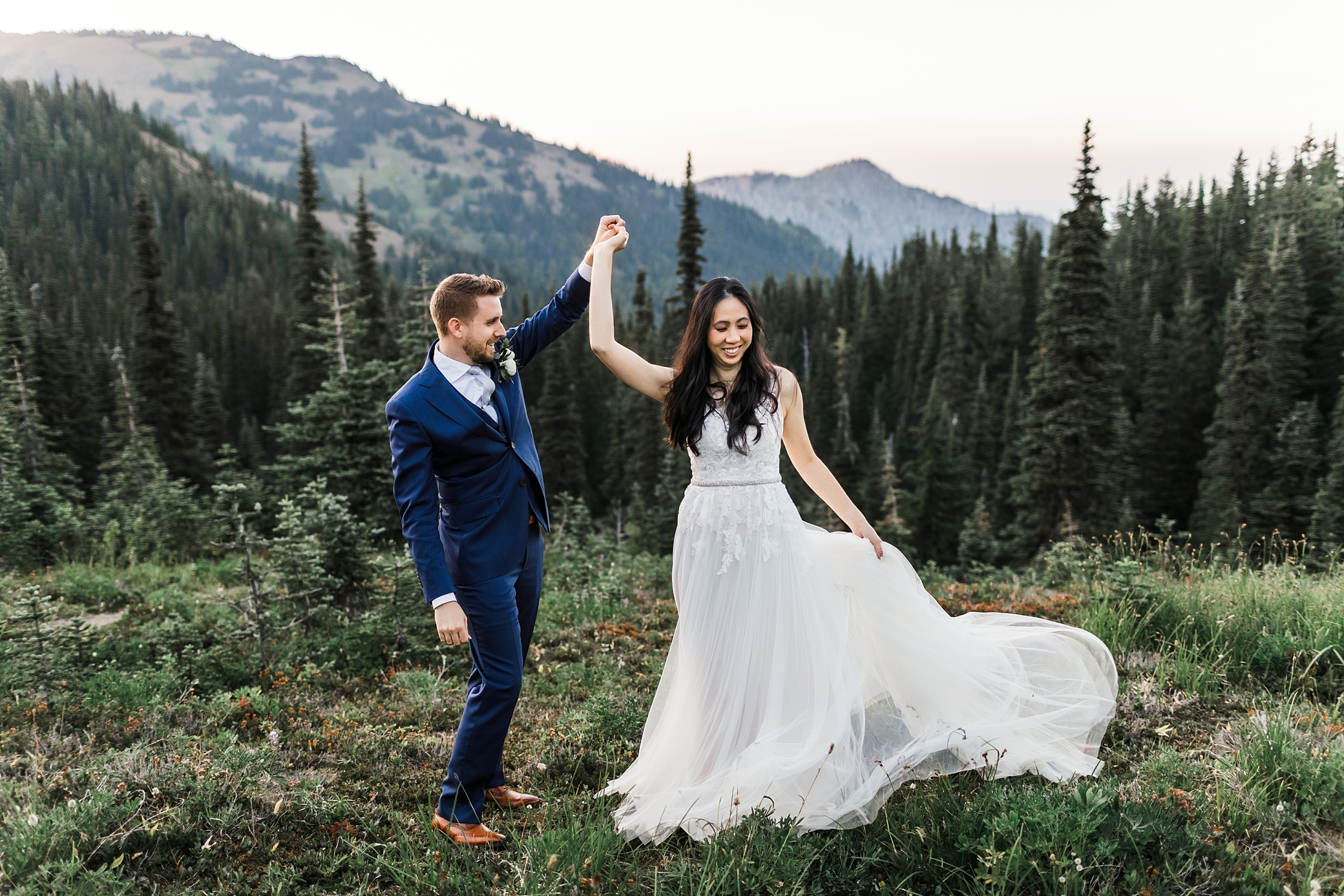 Bride and groom dancing in the Olympic National Park after intimate elopement ceremony at Hurricane Ridge | Megan Montalvo Photography 