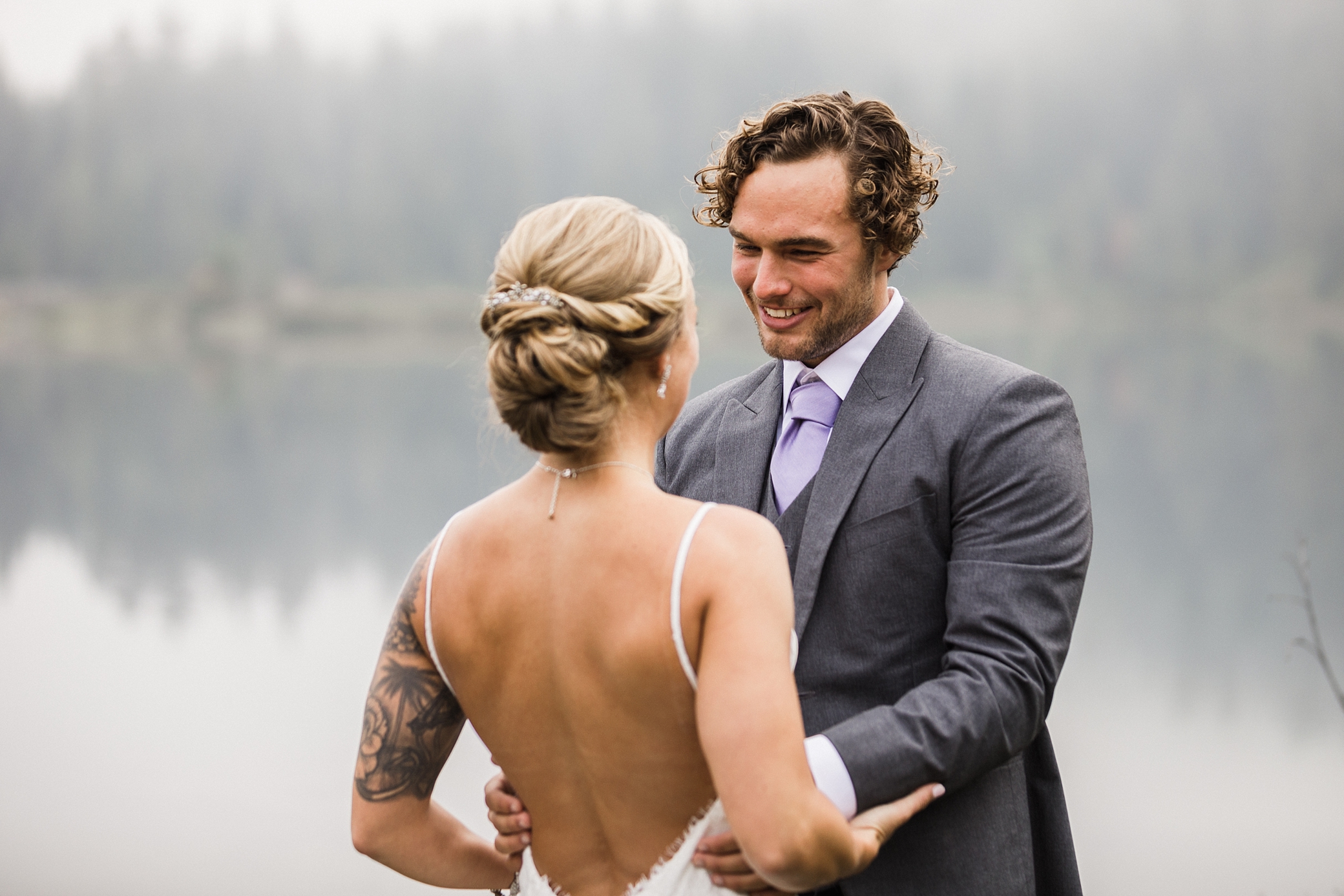 Bride and groom first look photographed by Seattle Elopement Photographer, Megan Montalvo Photography. 