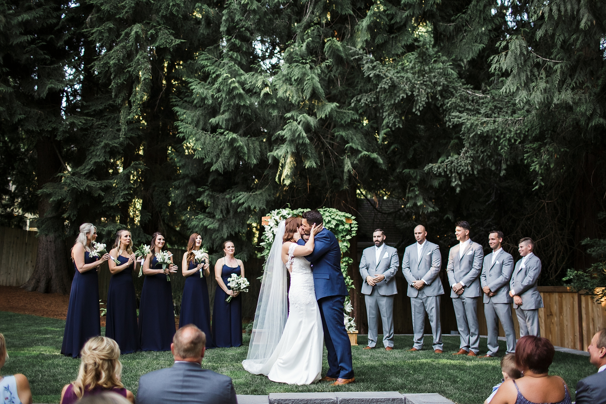 Bride and Groom first kiss | Tacoma Backyard Wedding | Megan Montalvo Photography 