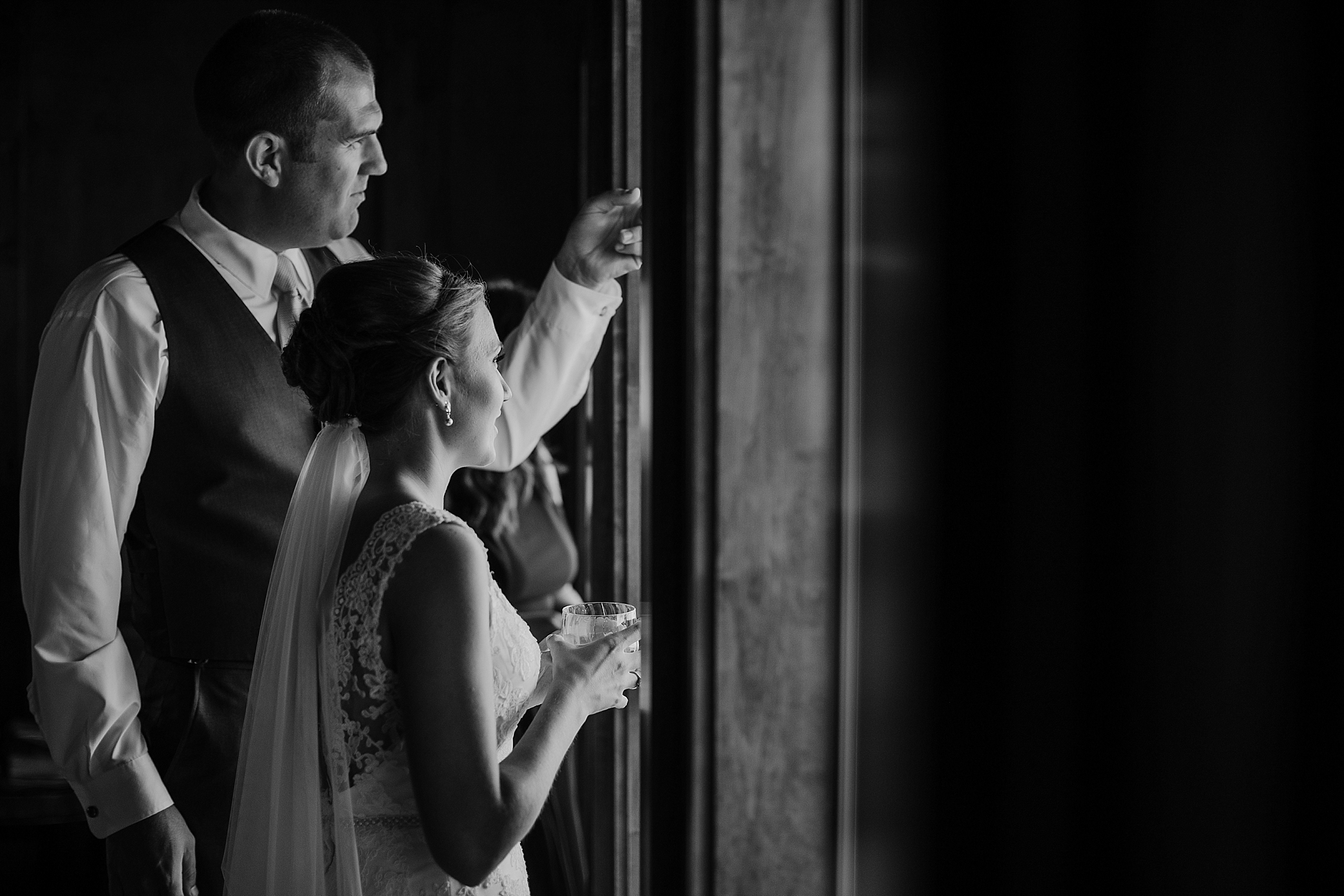 Bride and groom waiting on wedding ceremony to start at the Cattle Barn Wedding Venue | Megan Montalvo Photography 