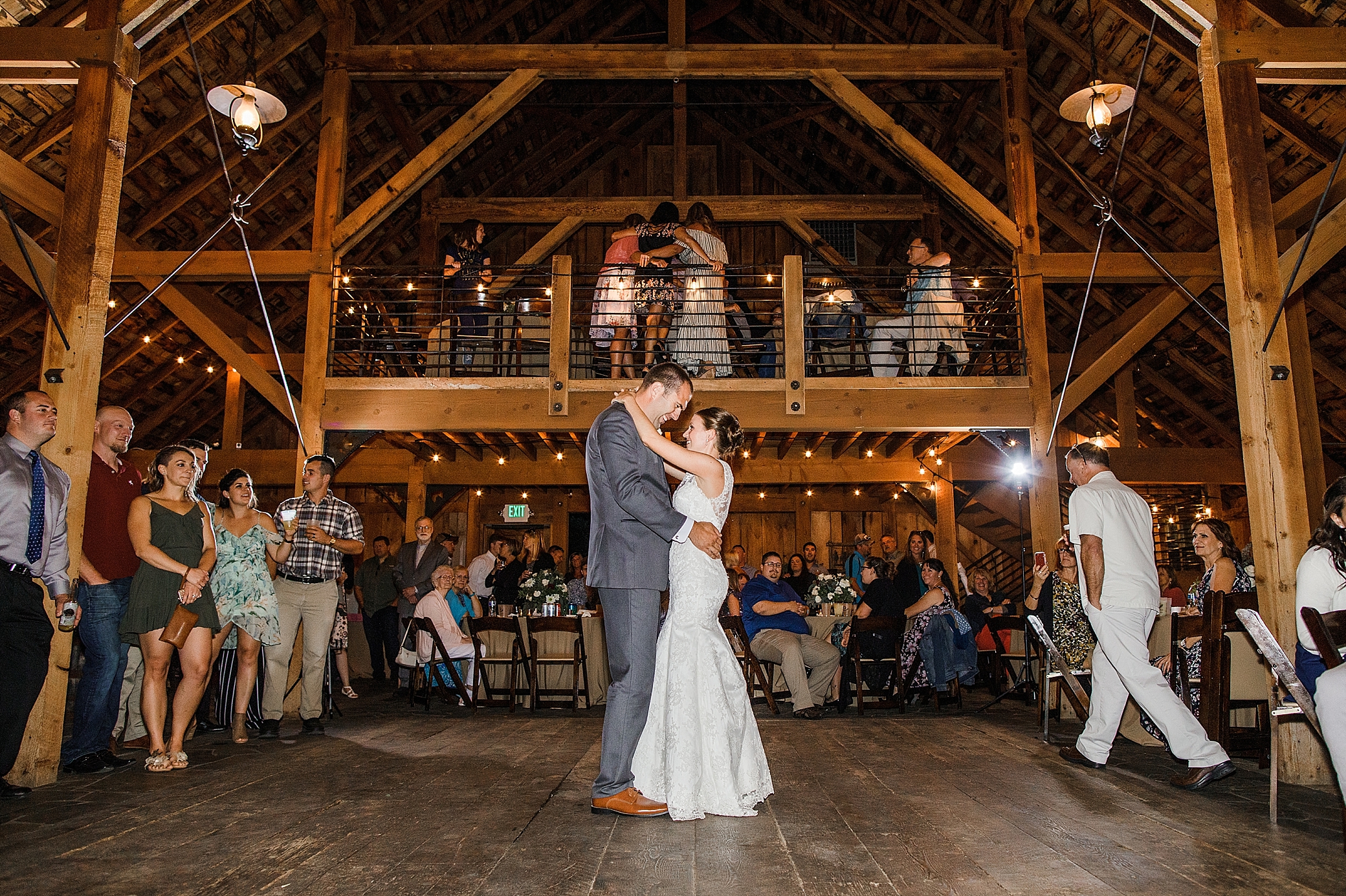 Bride and groom first dance at wedding reception at The Cattle Barn | Megan Montalvo Photography 