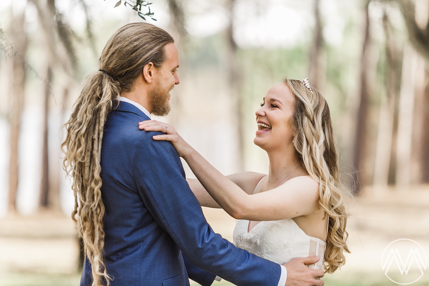 Bride and groom first look at Doe Lake Campground Wedding in the Ocala National Forest. Photographed by Orlando Wedding Photographer, Megan Montalvo Photography. 