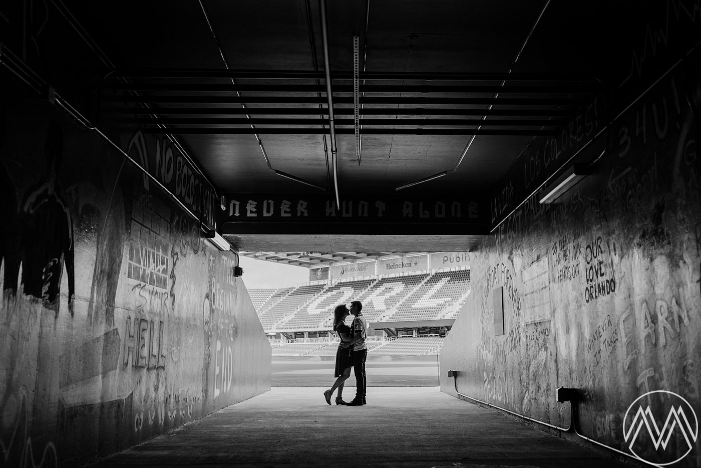 Orlando City Soccer Club fans have their engagement photos at the soccer stadium. Photographed by Orlando Wedding Photographer, Megan Montalvo Photography. 