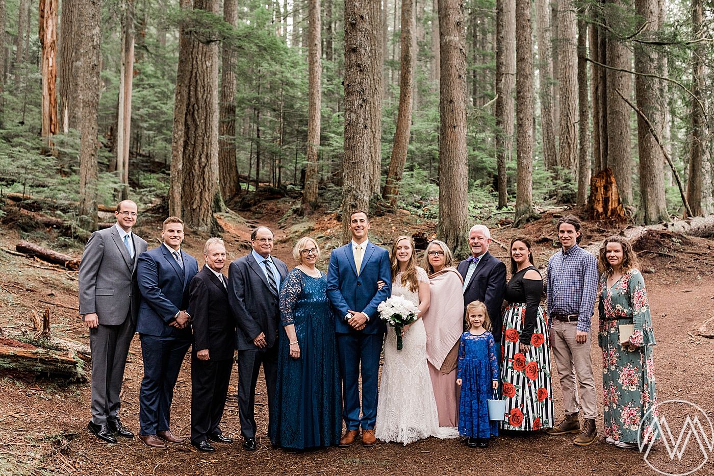Small, intimate wedding at Mount Rainier with the bride and grooms closest family and friends. Photographed by Adventure Elopement Photographer, Megan Montalvo Photography. 