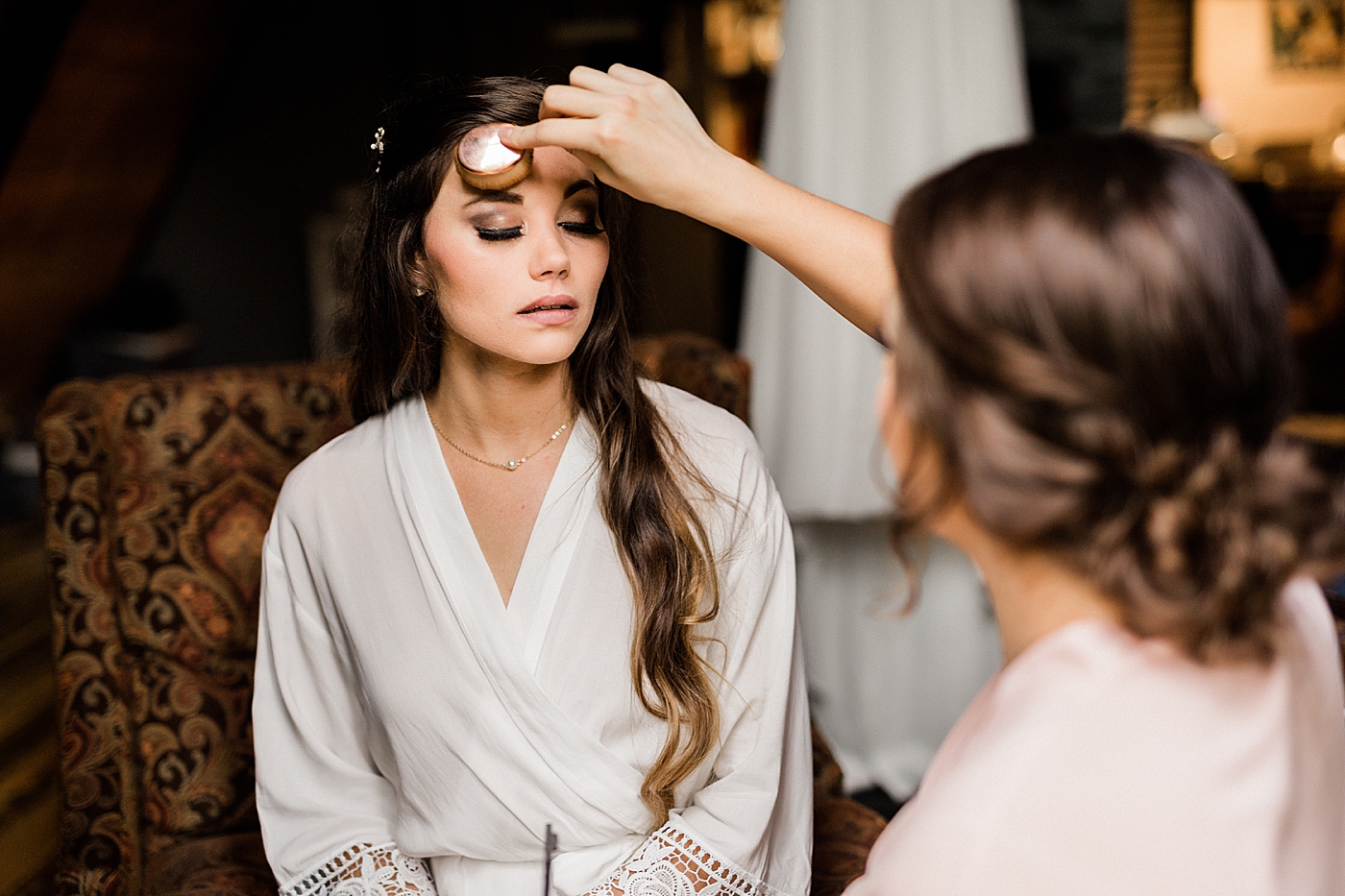 Bride getting ready for elopement at a cabin in Ashford, WA | Megan Montalvo Photography