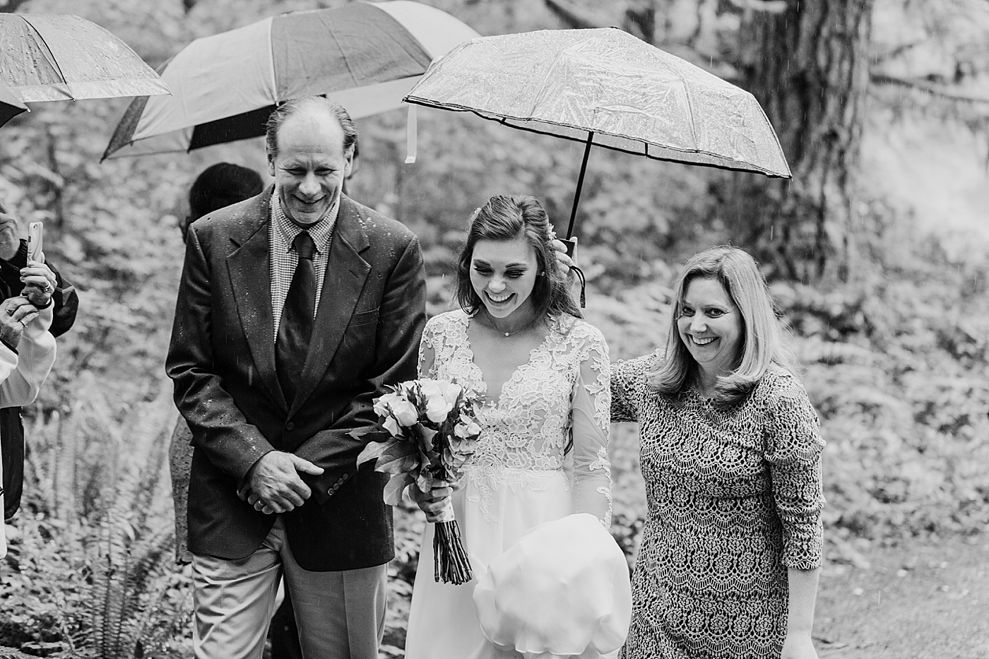 Parents walk bride to intimate elopement ceremony with groom and immediate family. Photographed by Seattle Elopement Photographer, Megan Montalvo Photography. 