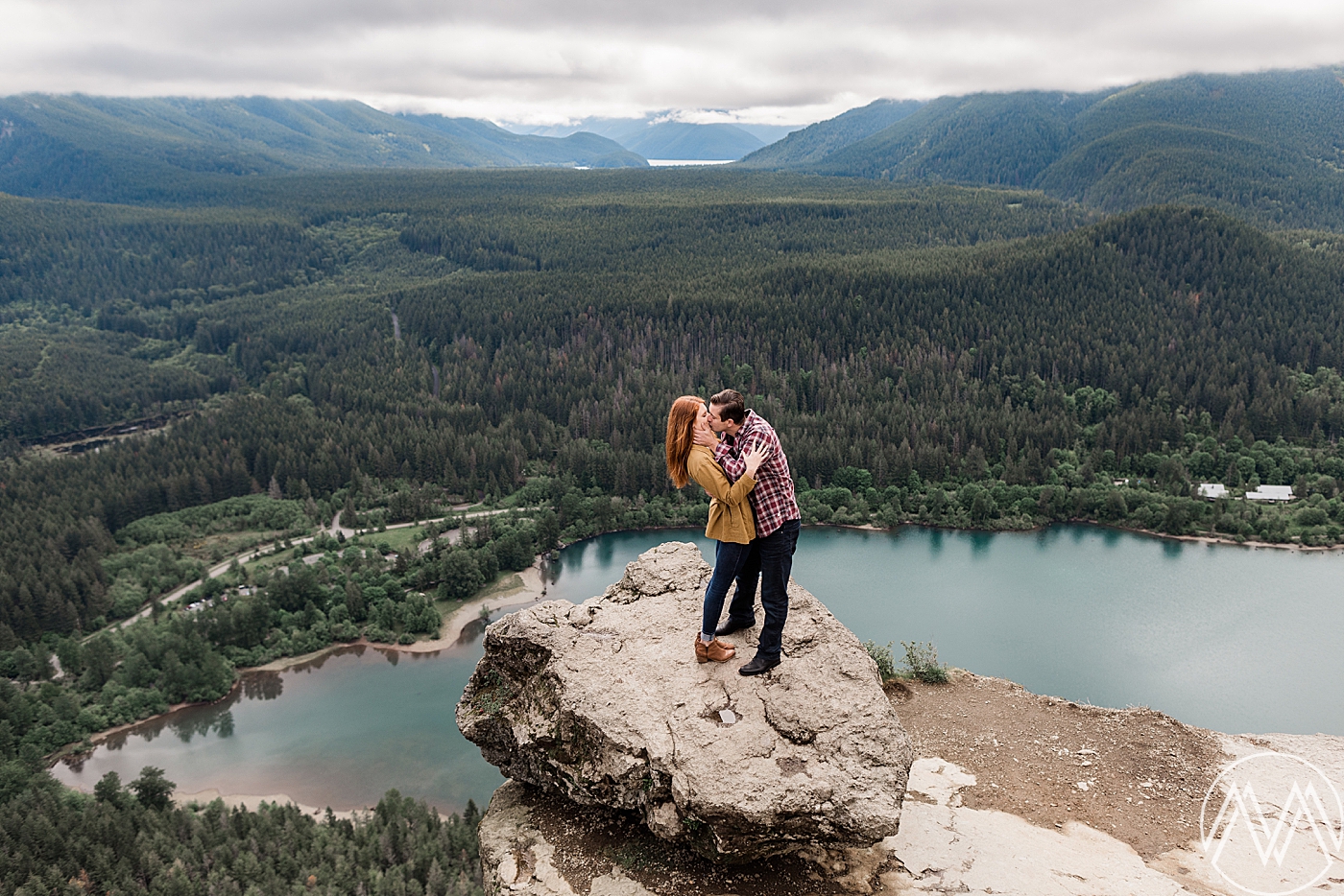 Adventure engagement session with views overlooking Rattlesnake Lake. Photographed by PNW Wedding Photographer, Megan Montalvo Photography. 