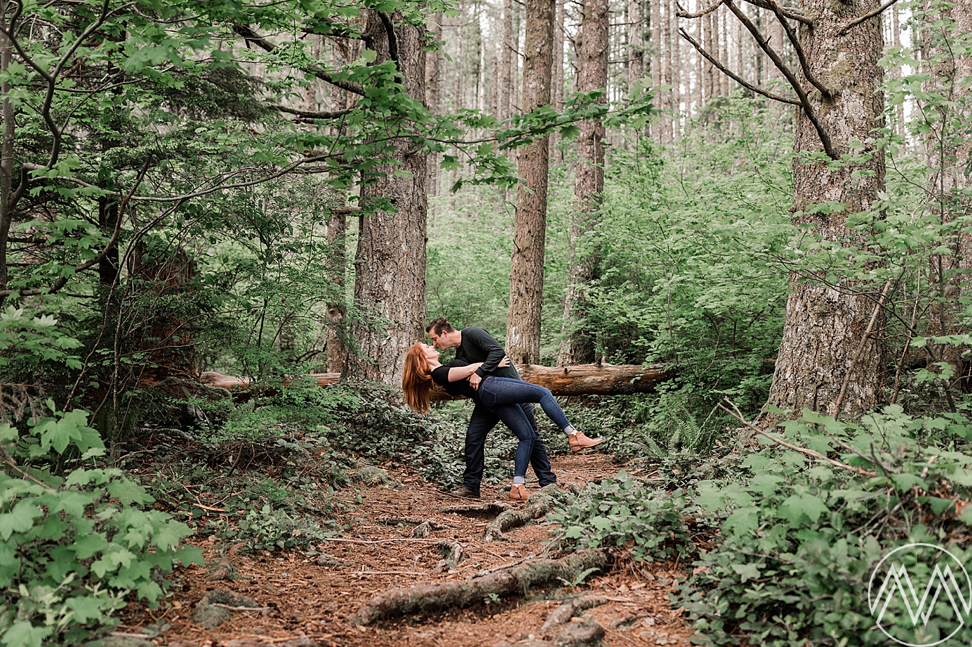 Seattle Engagement and Wedding Photographer photographs couple in the woods at Rattlesnake Lake. 