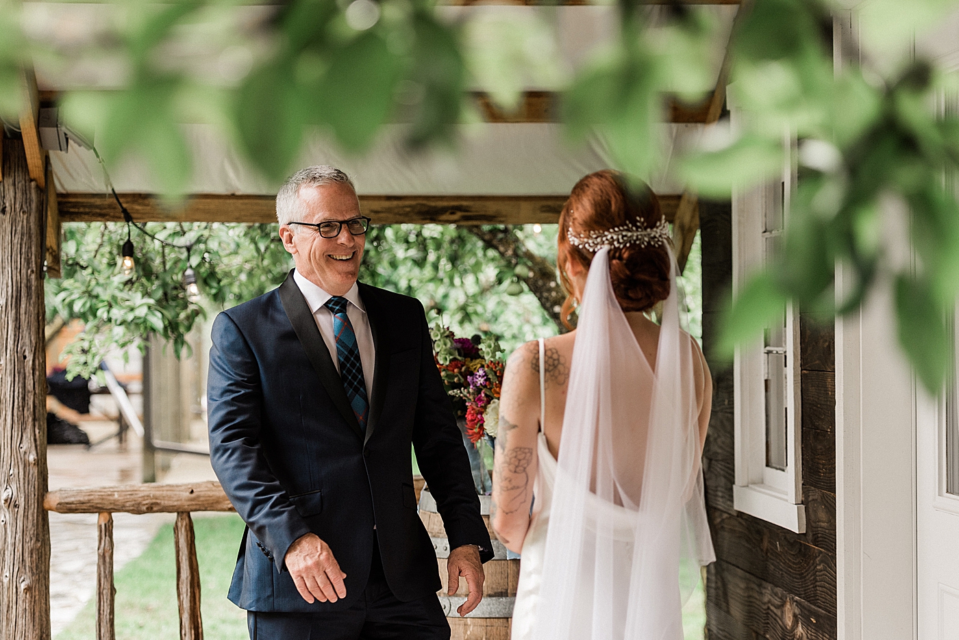 Bride and father first look outside the bridal suite at the Orchard at Sunshine Hill. Photographed by Olympia Wedding Photographer, Megan Montalvo Photography. 