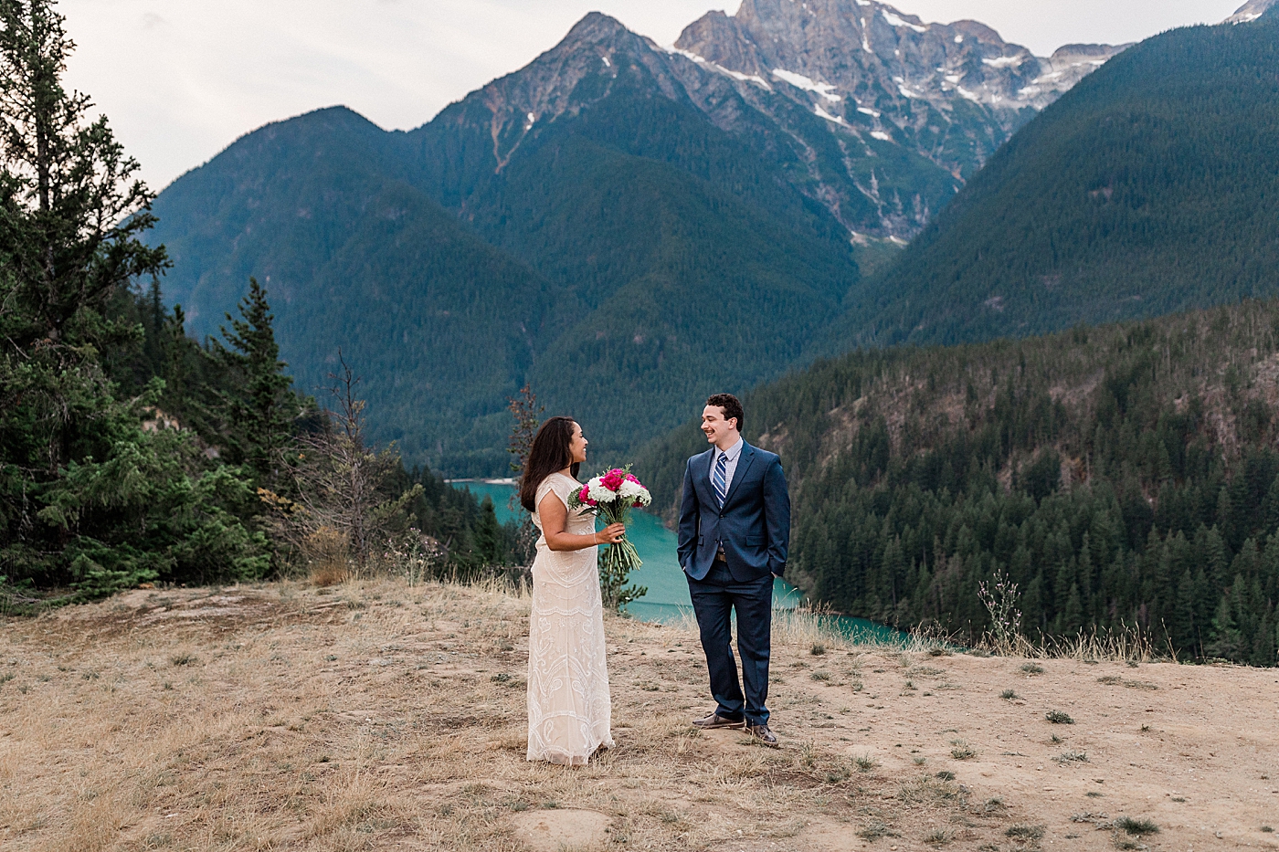 Bride and Groom first look at Diablo Lake Elopement. Photographed by Seattle Elopement Photographer, Megan Montalvo Photography. 