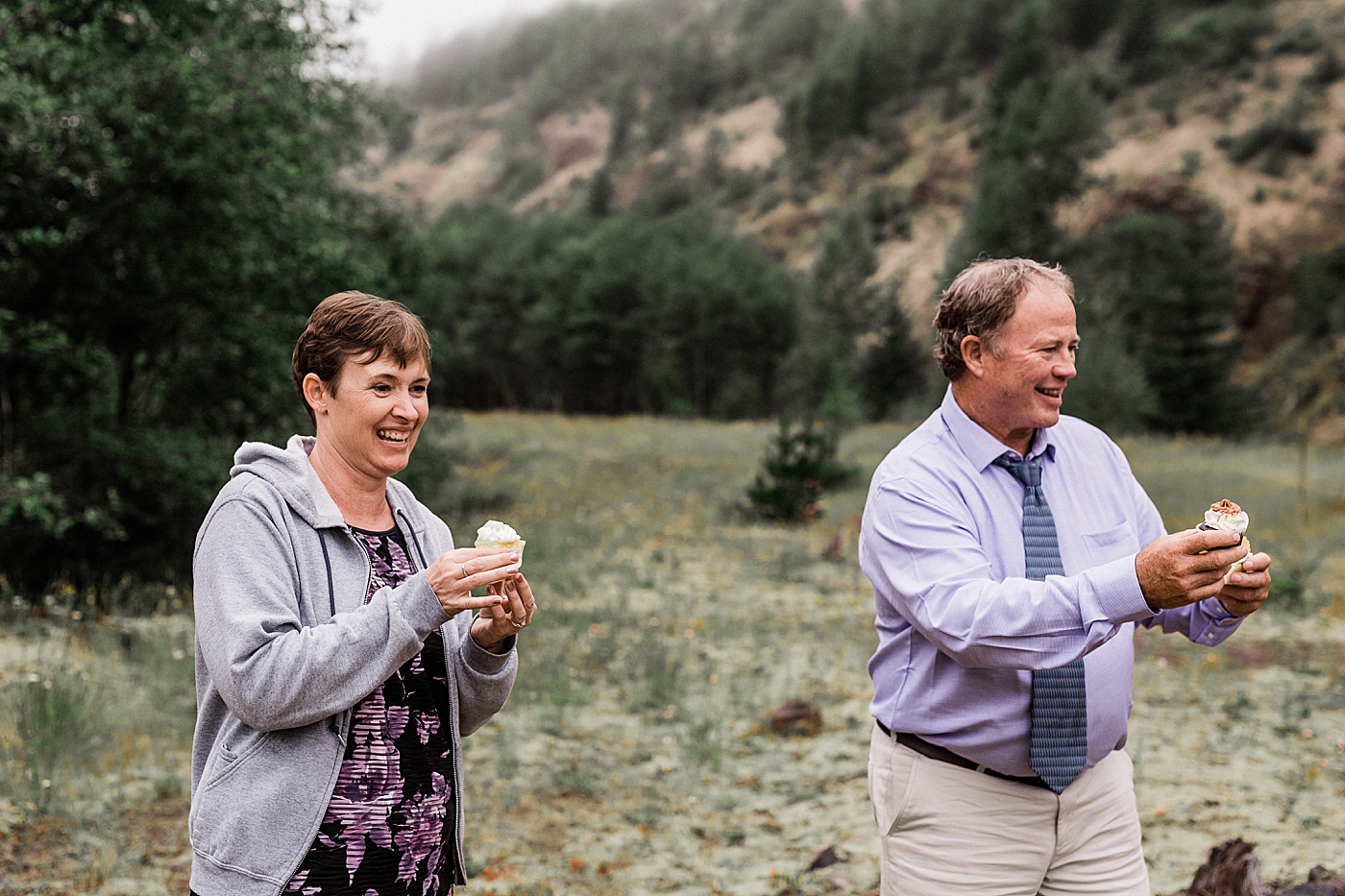 Couple celebrates with cupcakes and champagne at Mount St. Helens Elopement. Photographed by Adventure Elopement Photographer, Megan Montalvo Photography. 