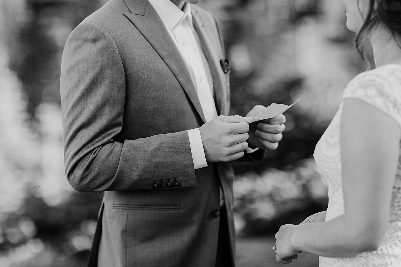 Bride and groom exchange private vows before Mount Rainier Elopement. Photographed by PNW Adventure Elopement Photographer, Megan Montalvo Photography. 