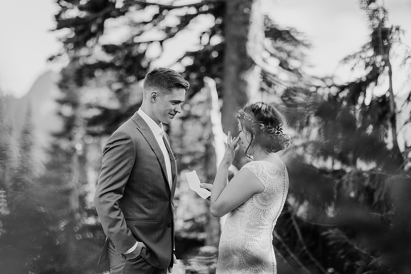 Bride and groom exchange private vows before Mount Rainier Elopement. Photographed by PNW Adventure Elopement Photographer, Megan Montalvo Photography. 