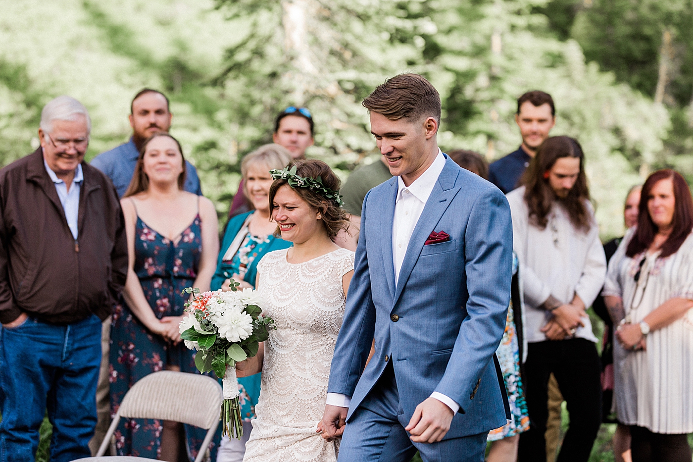 Bride and groom walk down the aisle together to intimate elopement ceremony together at Mount Rainier. Photographed by Adventure Elopement Photographer, Megan Montalvo Photography. 