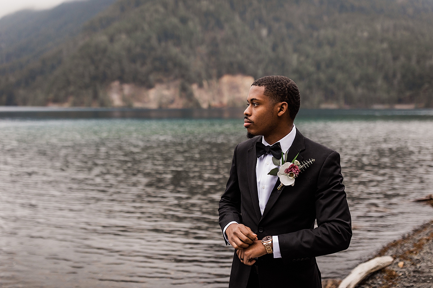 Groom waiting for first look at Crescent Lake in the PNW | Photo by Megan Montalvo Photography