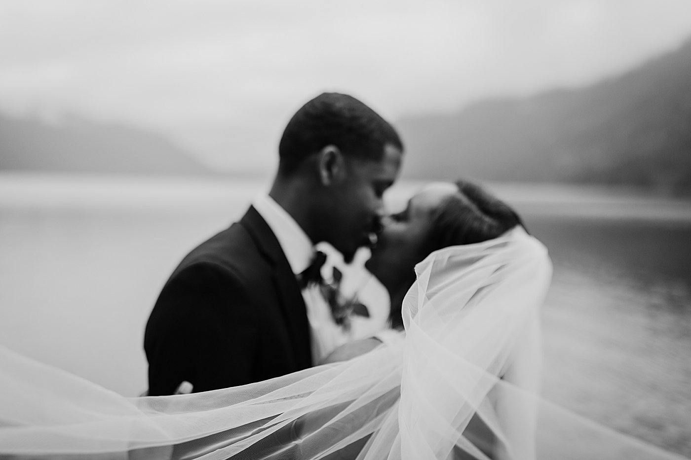 Beautiful black and white photo of bride and groom. Photo by Megan Montalvo Photography.