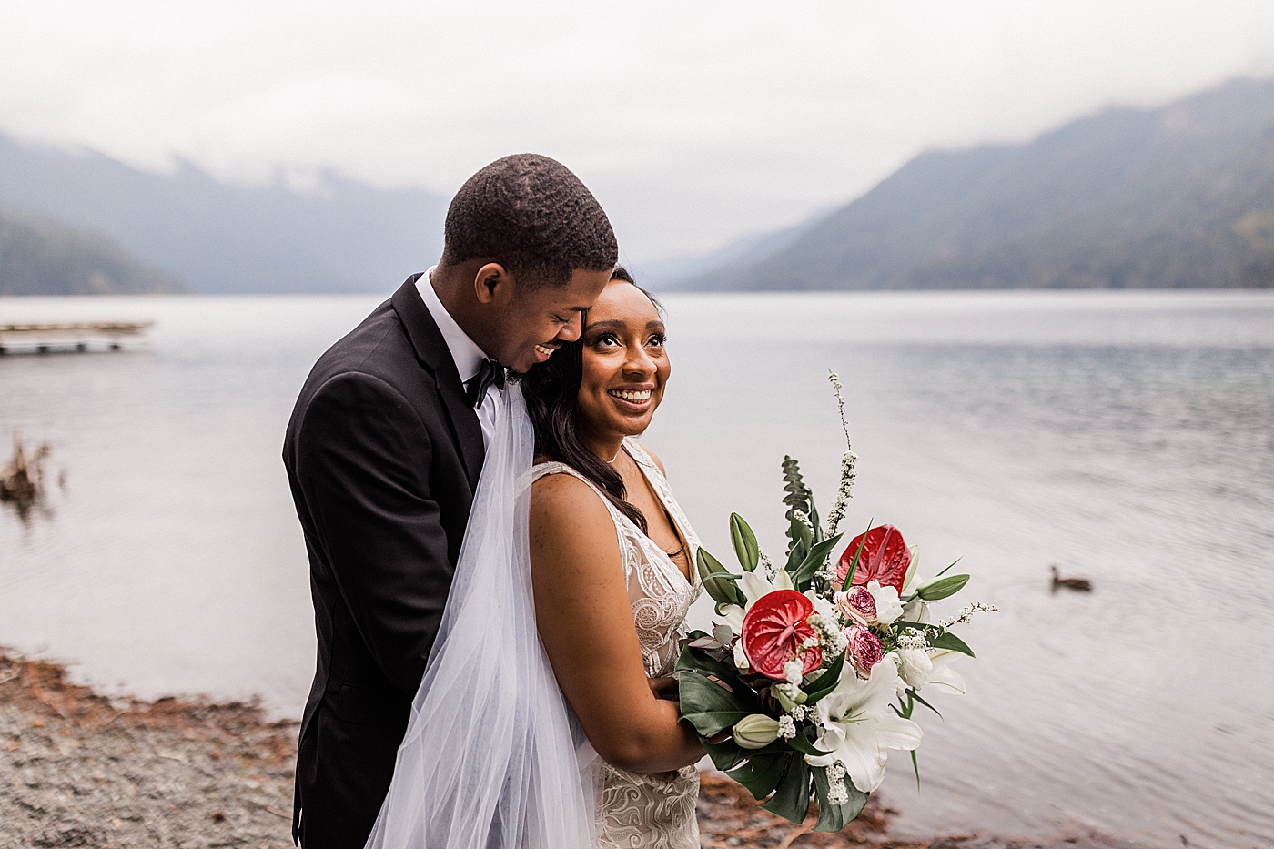 Elopement photos at Lake Crescent with Bride and Groom | Photo by Megan Montalvo Photography