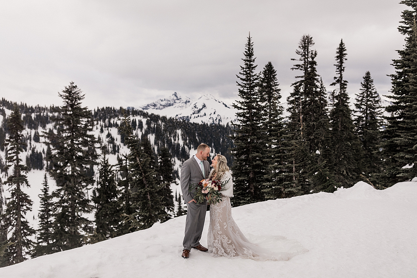Snowy Mt Rainier elopement at Paradise. Photo by Megan Montalvo Photography.