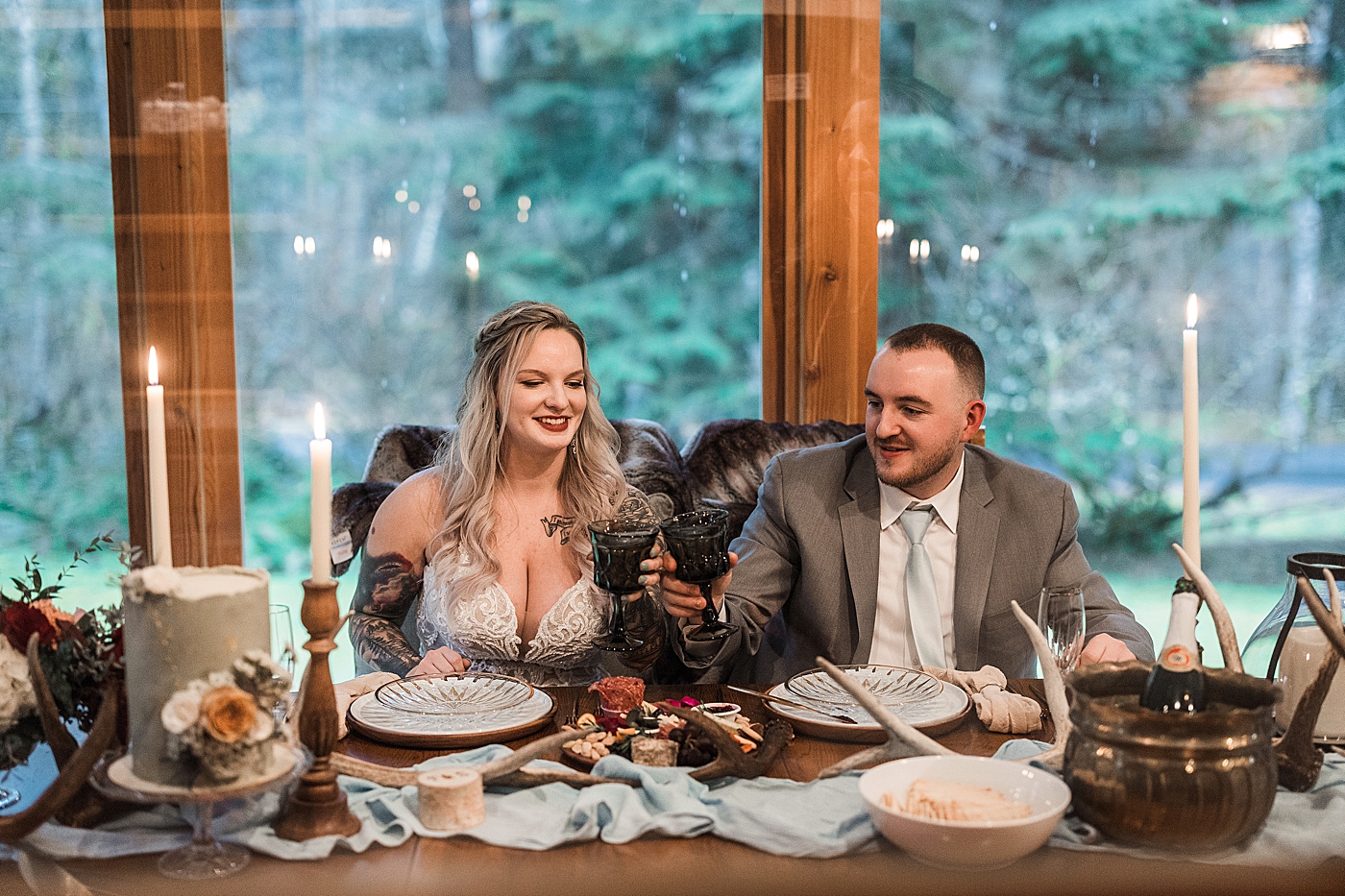 Newly married couple toasts during reception. Photo by Megan Montalvo Photography.