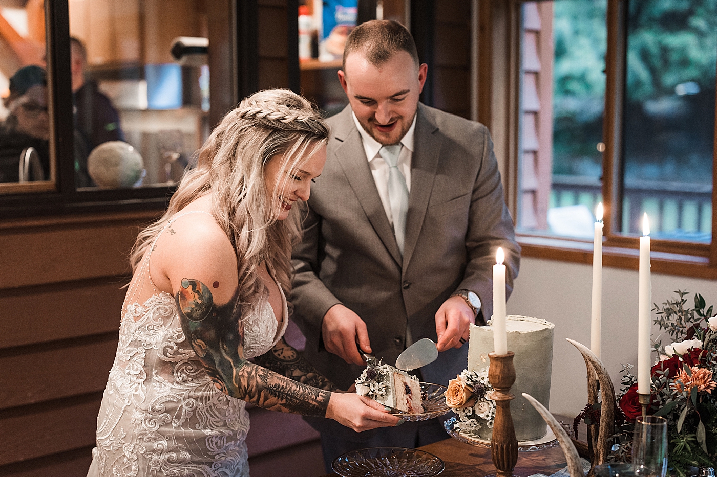Bride and groom cutting the cake. Photo by Megan Montalvo Photography.