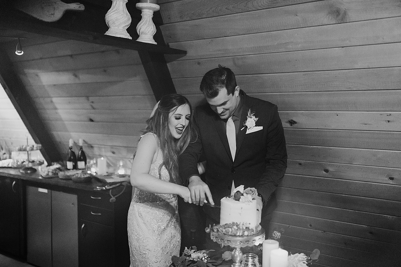Bride and groom cutting cake | Megan Montalvo Photography