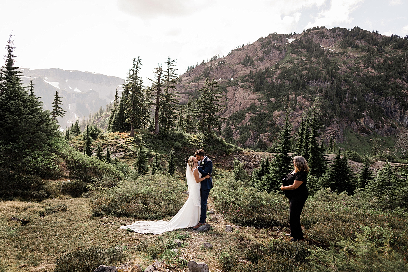 Bride and grooms first kiss | Photo by Megan Montalvo Photography.