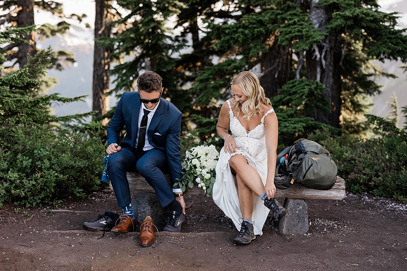 Couple hiking for elopement at Artist Point. Photo by Megan Montalvo Photography.