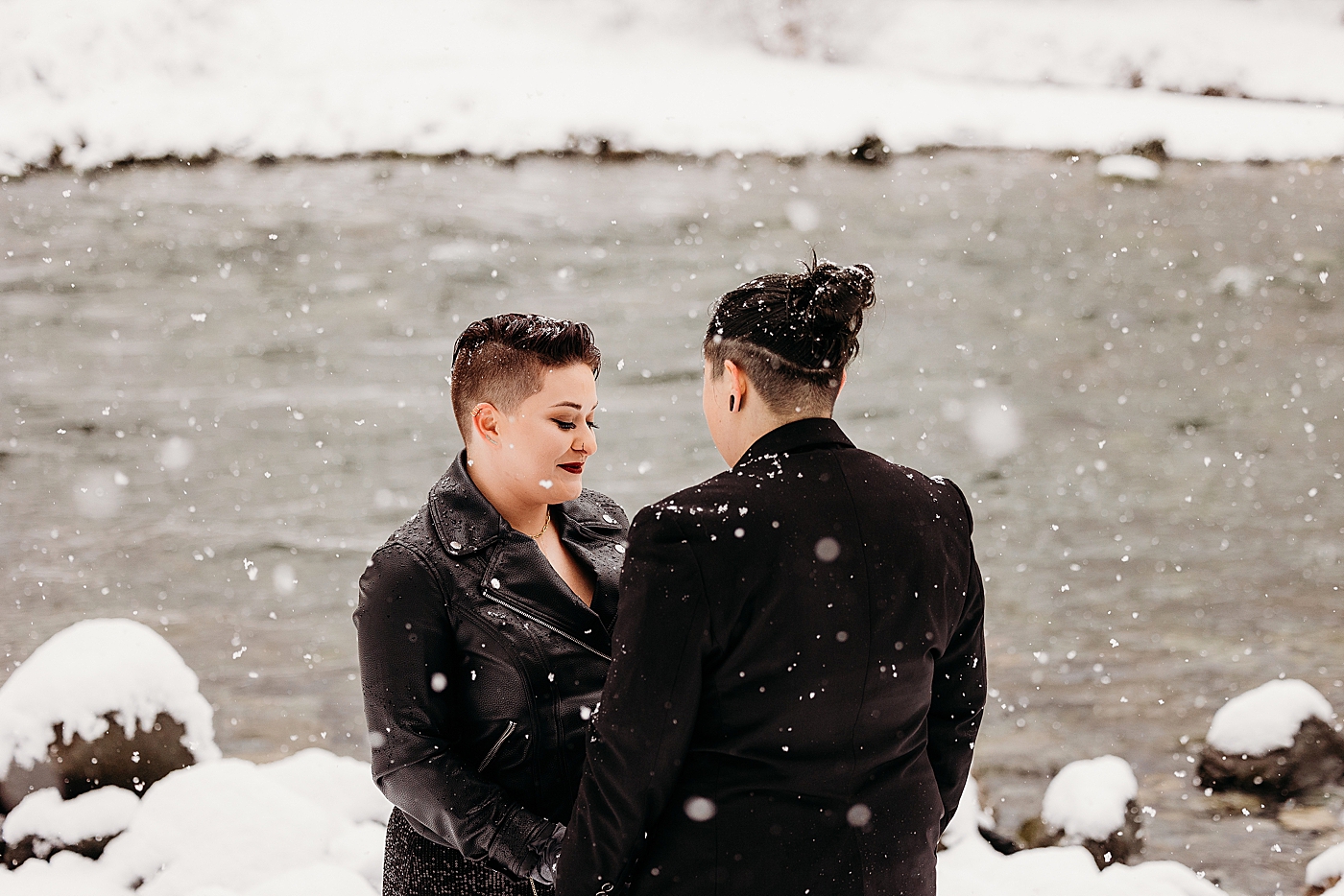 Vow exchange at Middle Fork in the PNW. Photo by Megan Montalvo Photography.
