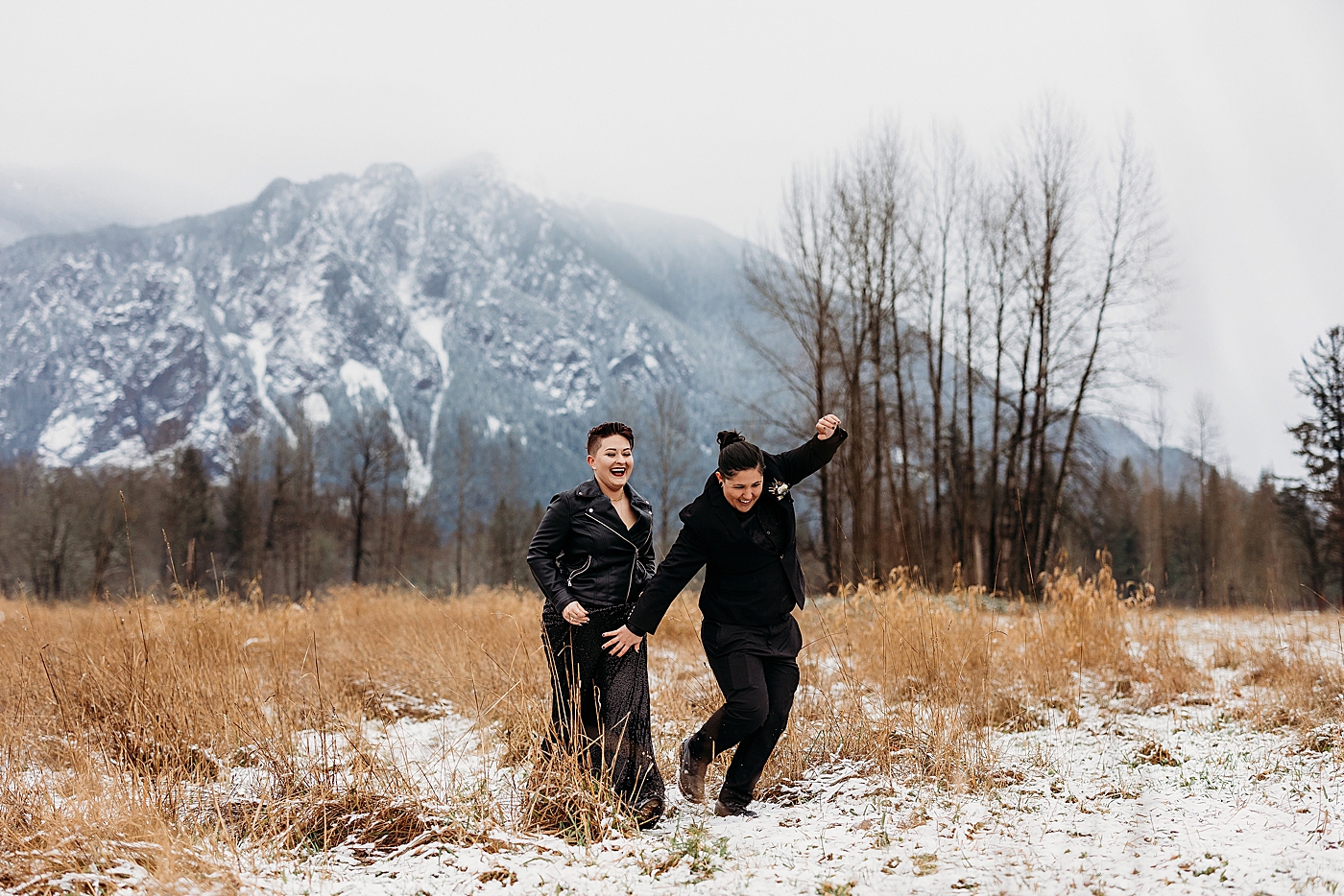 Couple being playful during elopement. Photo by Megan Montalvo Photography.