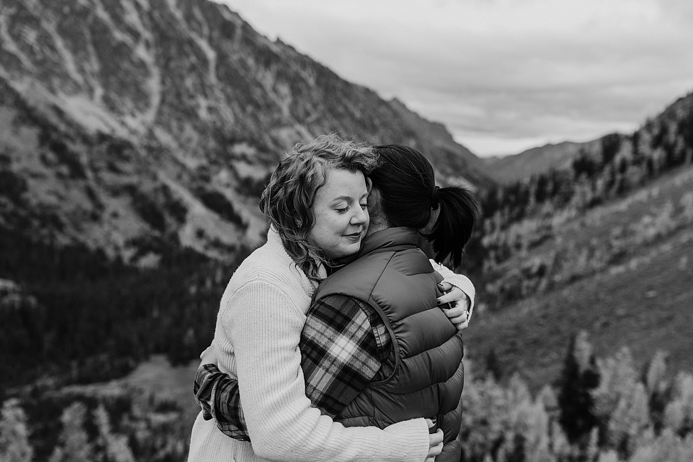 Couple embracing each other during engagement photos with Megan Montalvo Photography.