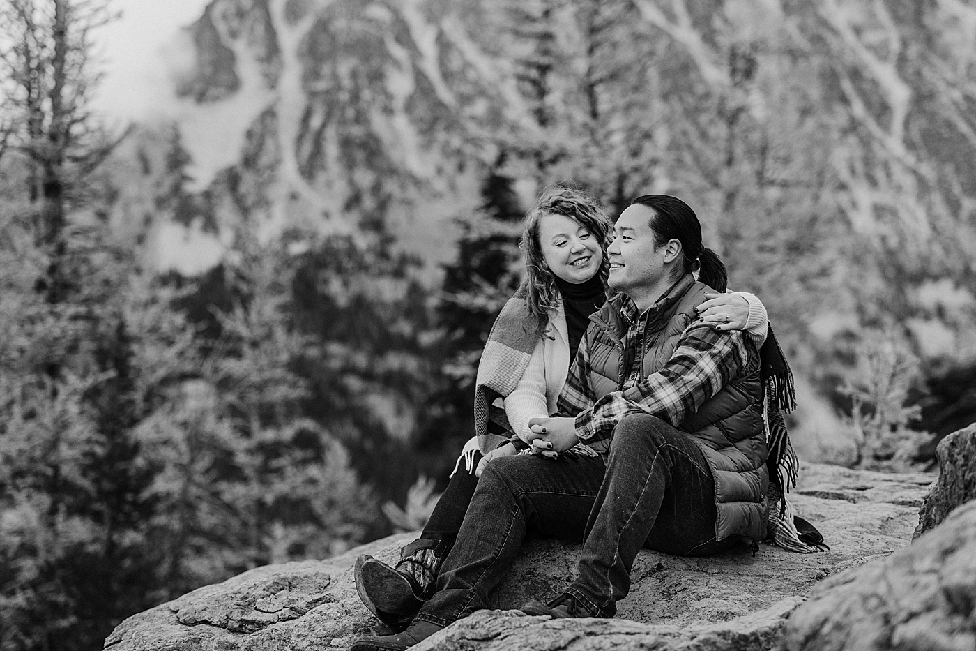 Black and white photo of couple during engagement session. Photo by Megan Montalvo Photography.